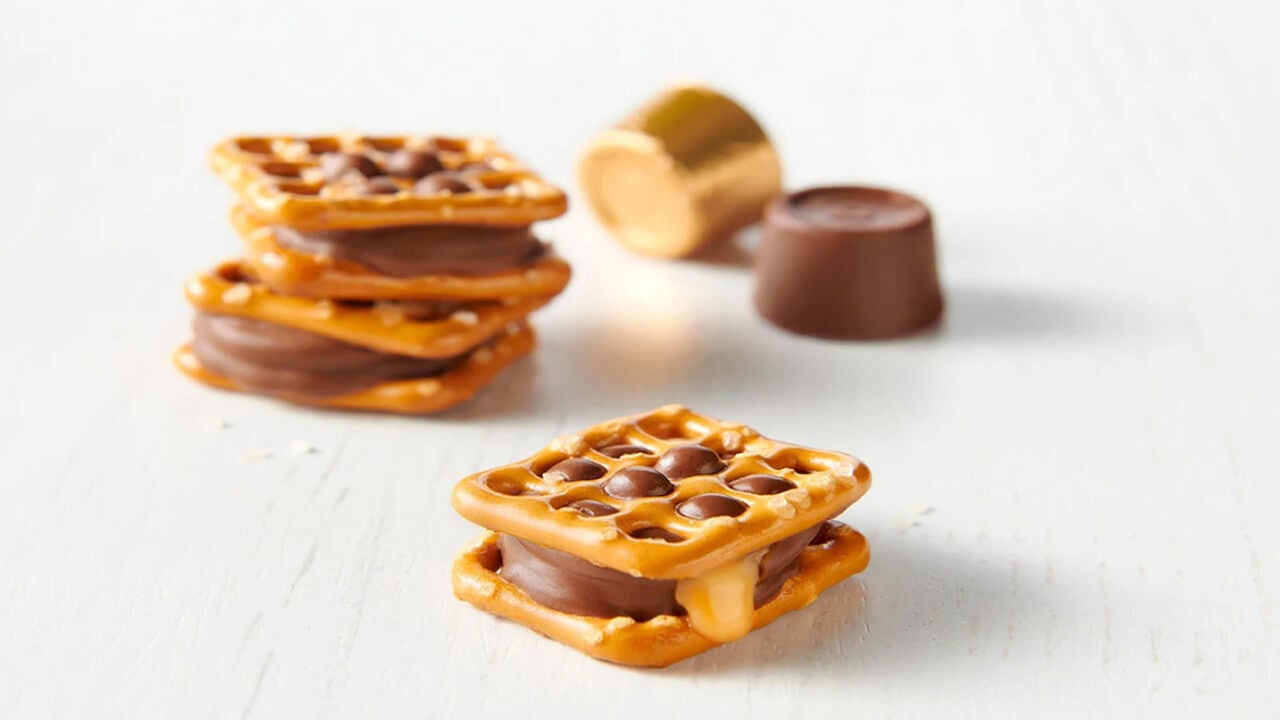 rolo pretzel sandwiches beside wrapped and unwrapped rolo creamy caramels