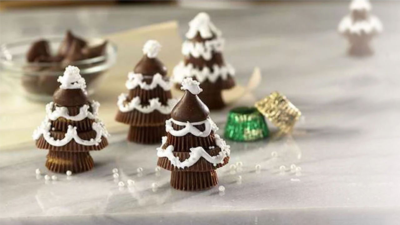 set of freshly made hersheys chocolate candy trees with white icing