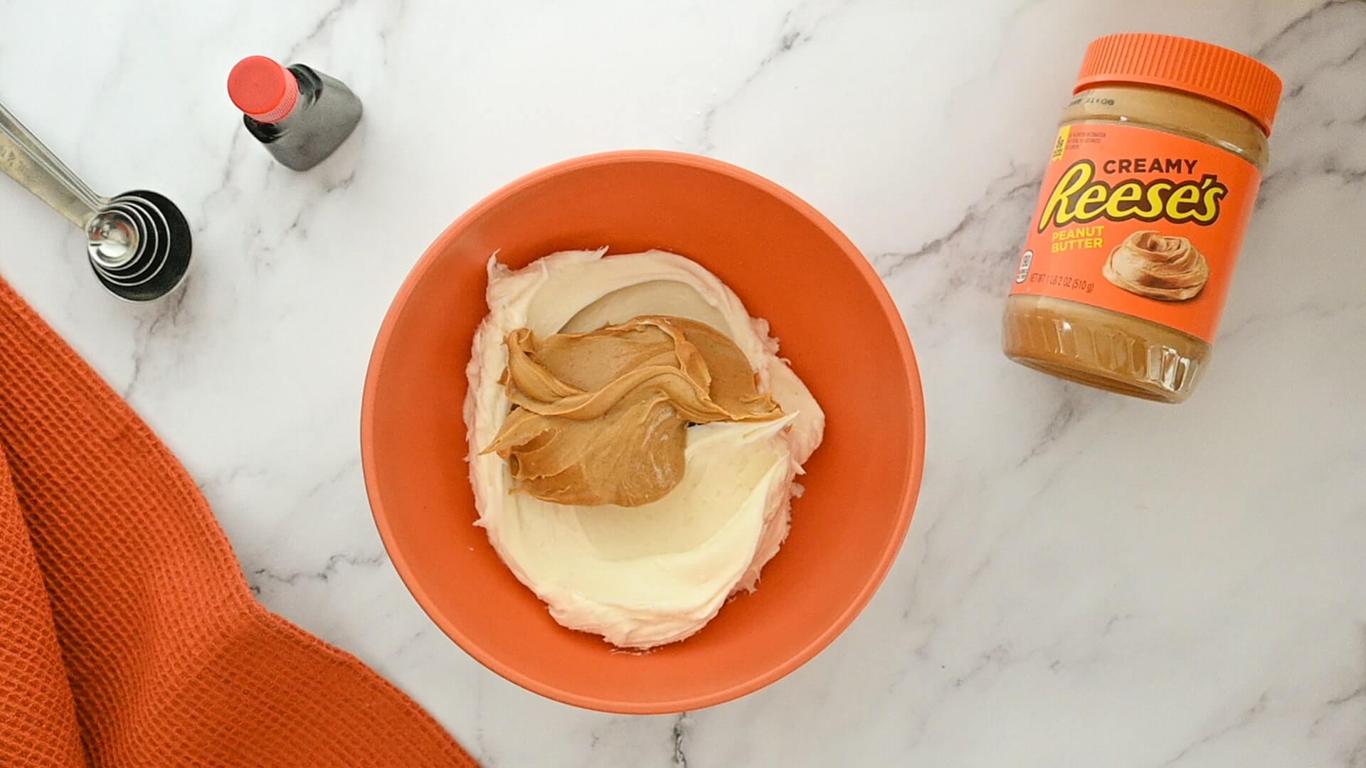 peanut butter creme frosting ingredients added to mixing bowl
