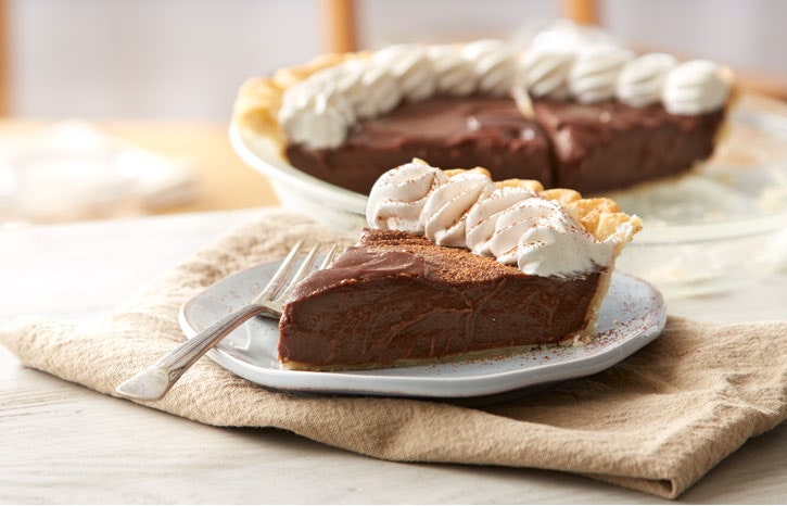 chocolate pie cut into clices for serving