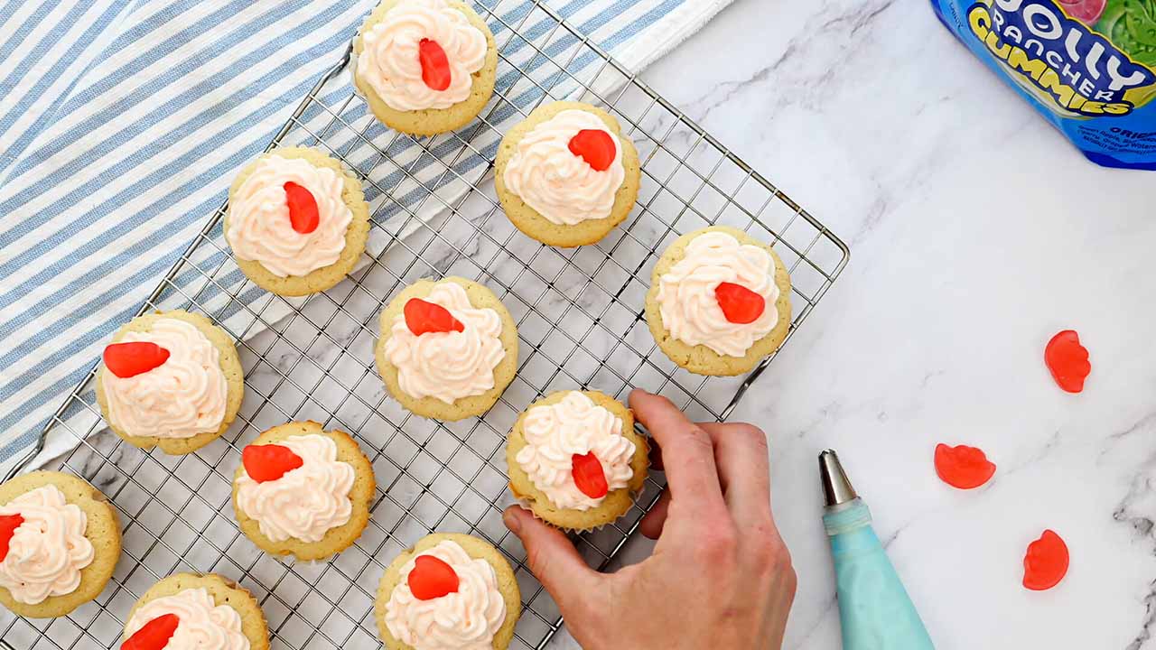 pipe frosting onto each cupcake and top with a jolly rancher gummy