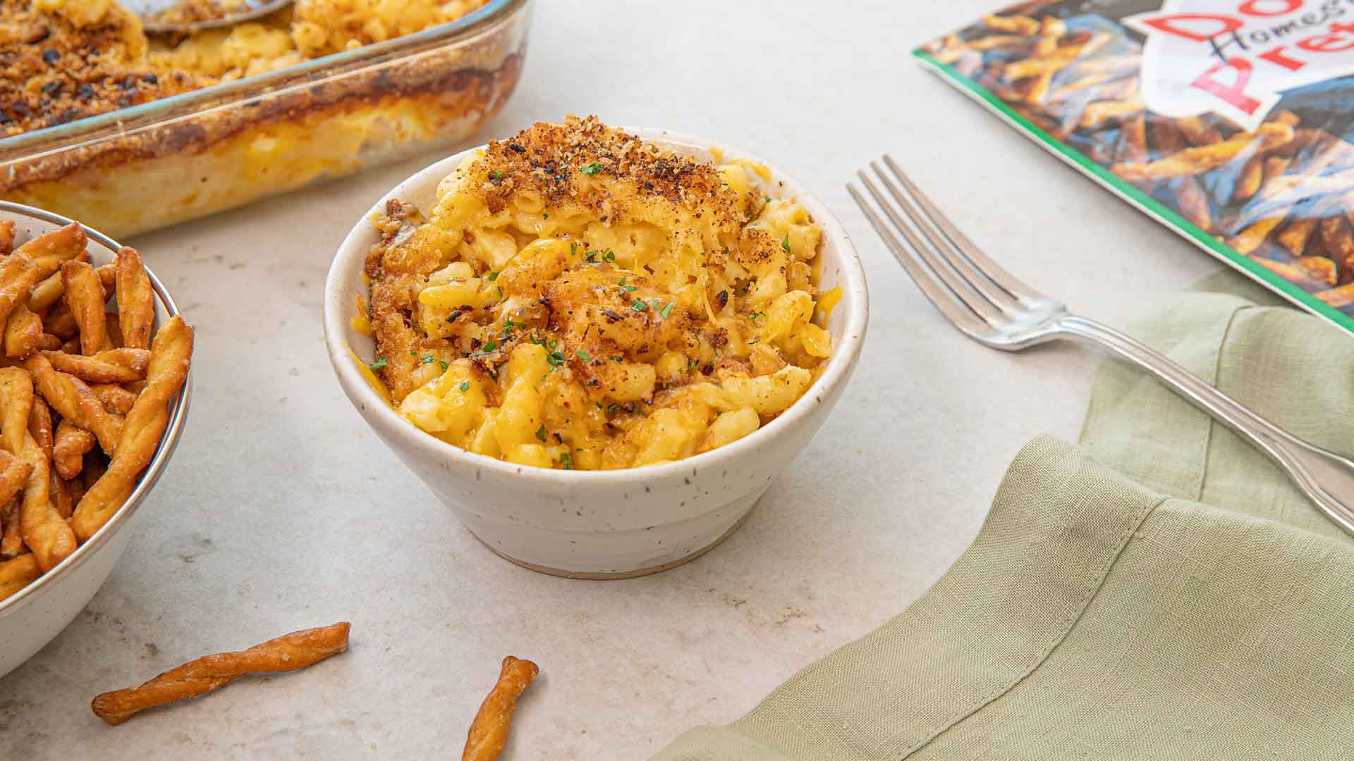 bowl of freshly made dots pretzel crusted mac and cheese