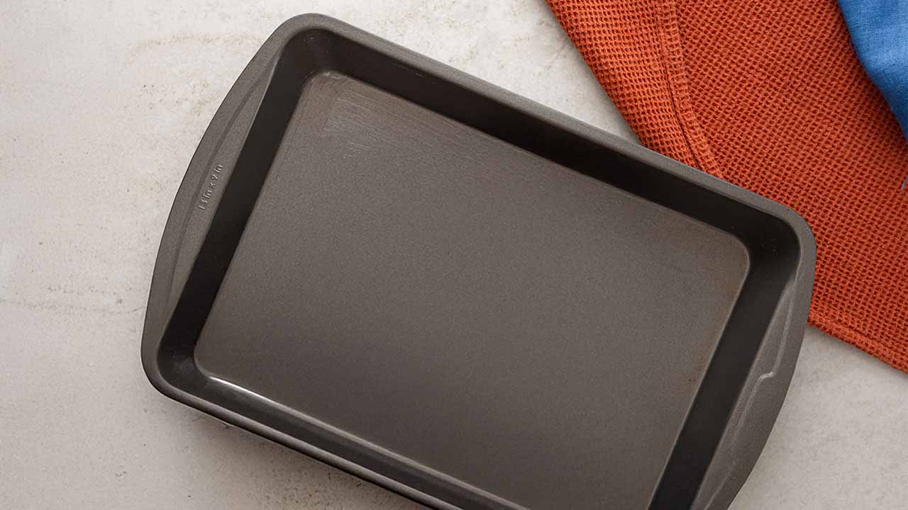 greasing the baking pan