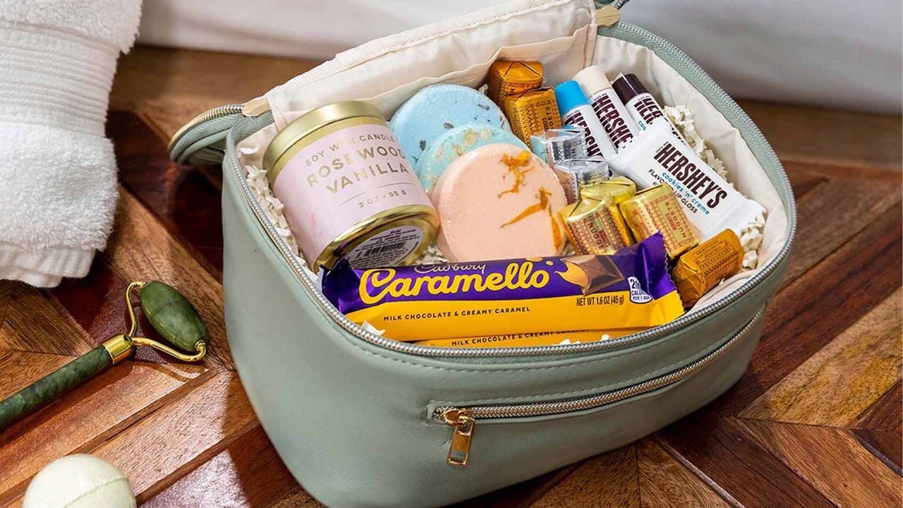 bag filled with spa essentials and assorted hersheys candies