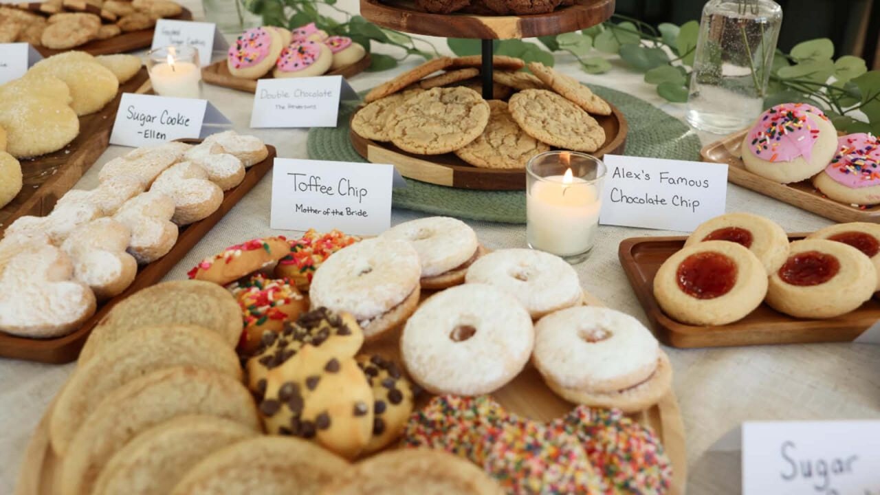 close up of an assortment of plated cookies paired with flavor labels