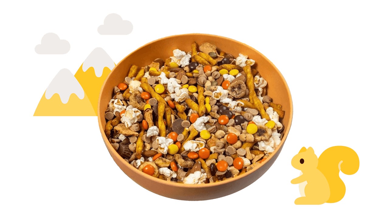 mountains and animal illustrations paired with bowl of hersheys homemade trail mix
