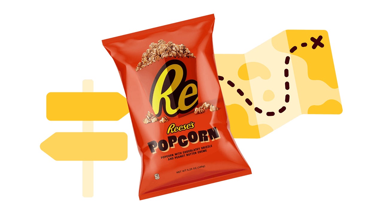 map and sign illustrations paired with bag of reeses popcorn