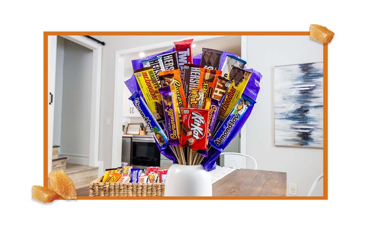 candy bar bouquet on living room coffee table