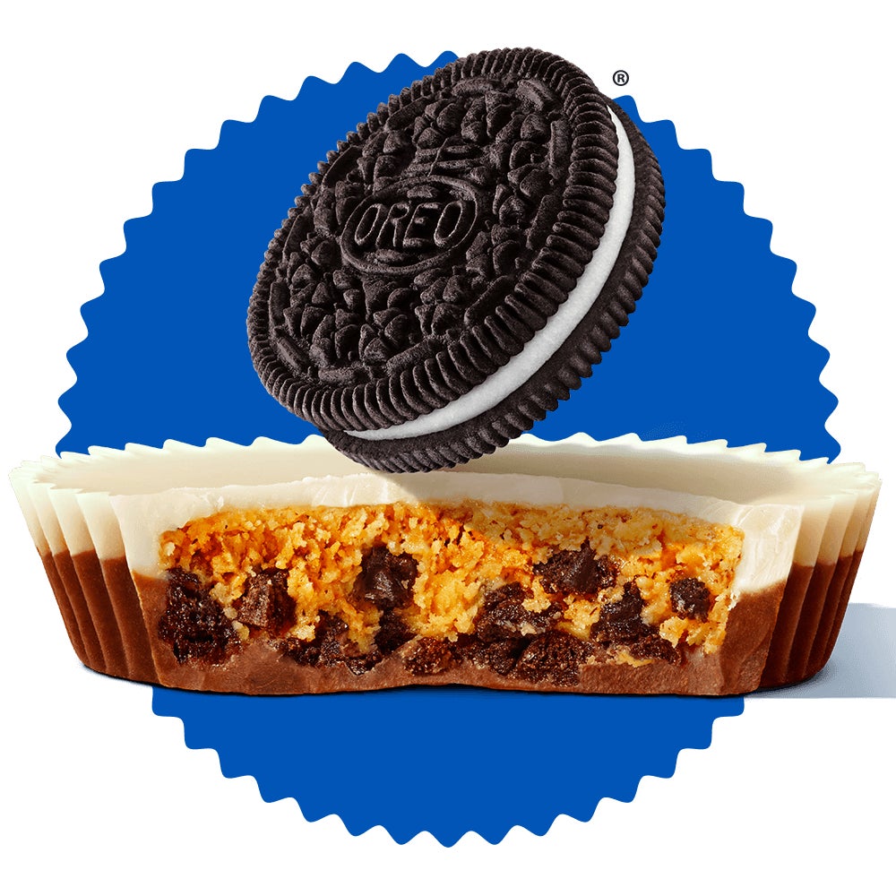 Oreo cookie on top of a Reese's Oreo milk chocolate peanut butter cup