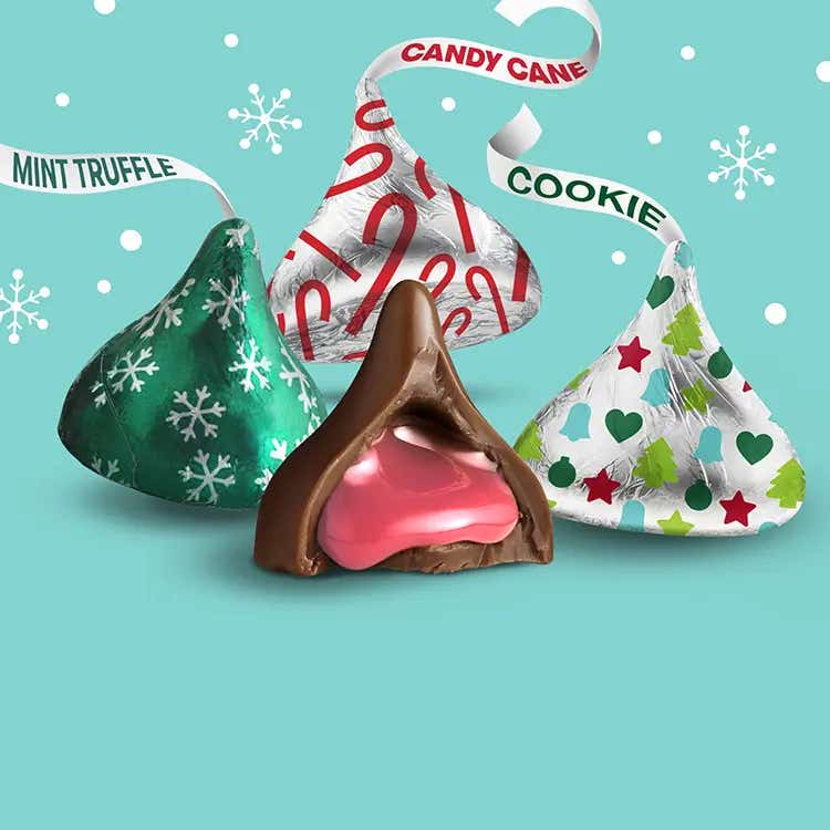 assortment of wrapped and unwrapped hersheys kisses candies